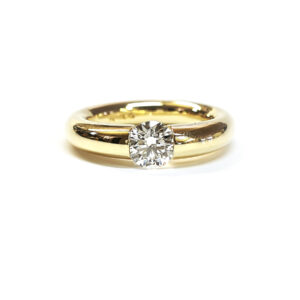 Niessing Spannring Verlauf in Gelbgold Brillant 0,81ct