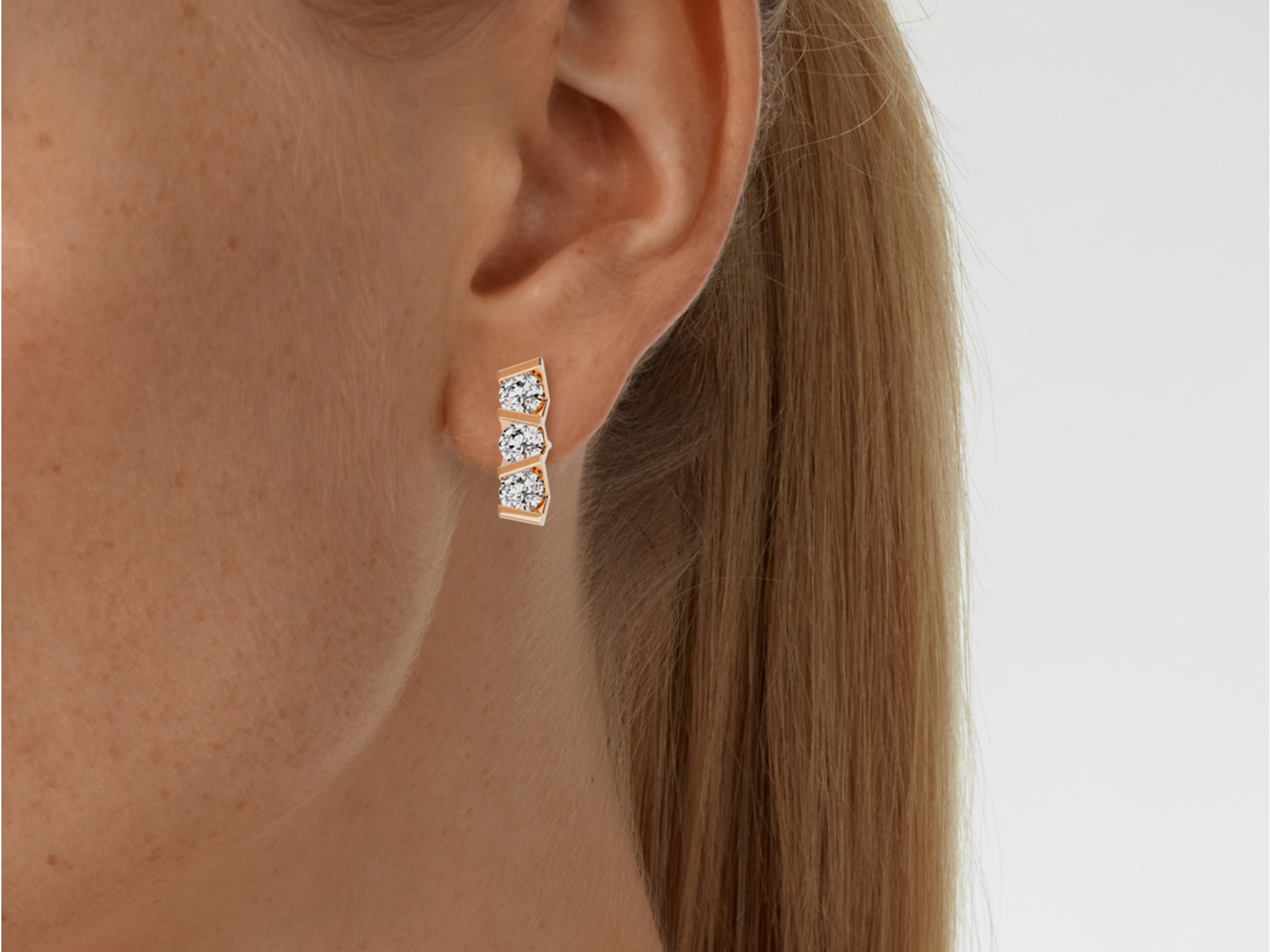 Niessing Vivida Ohrstecker mit je 3 weißen Brillanten 0,23ct in der Farbe Rosewood